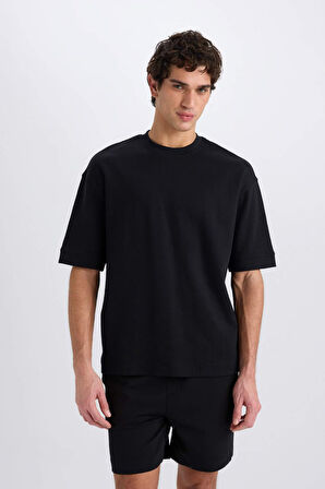 DeFacto Loose Fit Bisiklet Yaka Kısa Kollu Ağır Kumaş Basic Düz Tişört B4844AX25SPBK81
