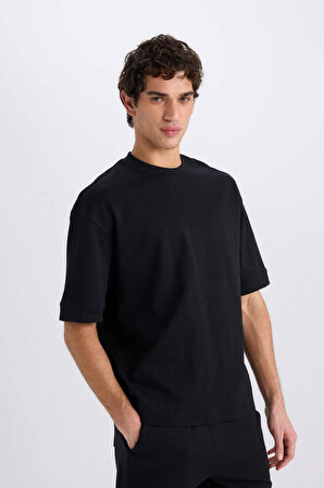 DeFacto Loose Fit Bisiklet Yaka Kısa Kollu Ağır Kumaş Basic Düz Tişört B4844AX25SPBK81