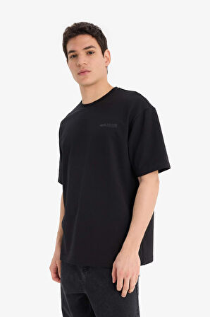 DeFacto Boxy Fit Bisiklet Yaka Baskılı Kısa Kollu Tişört E3460AX25SPBK81