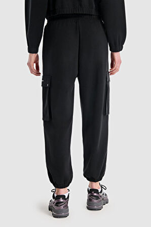 New Balance Lifestyle WNP1529-BK Siyah Kadın Eşofman Altı