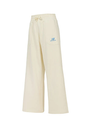 New Balance WNP3515-SST Lifestyle Women Pant Bej Lastikli Bel Regular Fit Düz Kadın Eşofman Altı