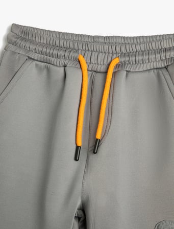 Jogger Eşofman Altı Beli Bağlamalı Cepli Paraşüt Kumaş Detaylı