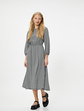 Kışlık Elbise Maksi Boy Uzun Kollu Yuvarlak Yaka Gipe Detaylı Kazayağı Desenli