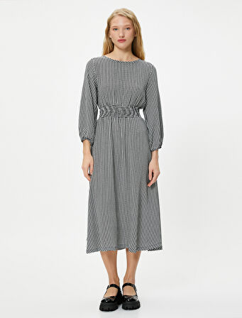 Kışlık Elbise Maksi Boy Uzun Kollu Yuvarlak Yaka Gipe Detaylı Kazayağı Desenli