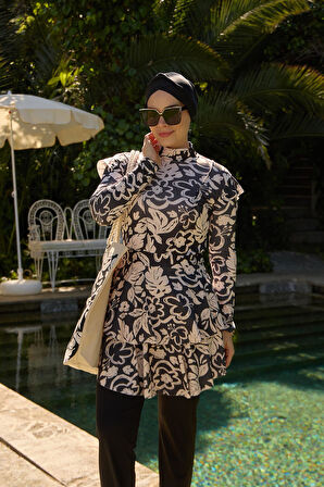 Tam Kapalı Mayo Likralı Fulya Model Beyaz Yaprak Desenli Siyah