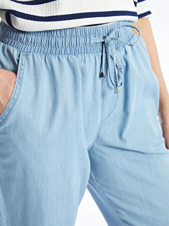 LCWAIKIKI Classic Bej Beli Lastikli Carrot Fit Kadın Jean Pantolon