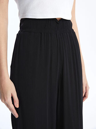 LCWAIKIKI Classic Siyah Beli Lastikli Dokulu Geniş Paça Kadın Pantolon