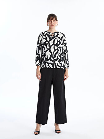 LCWAIKIKI Classic Siyah Bağlamalı Yaka Çiçekli Uzun Kollu Kadın Bluz