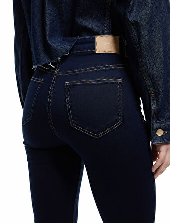 Dar Kesim Düğmeli Cep Detaylı İspanyol Paça Jean Pantolon - Flare Jeans