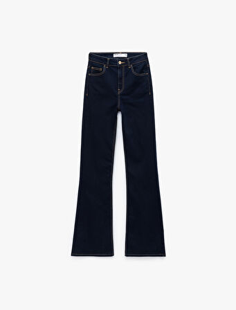 Dar Kesim Düğmeli Cep Detaylı İspanyol Paça Jean Pantolon - Flare Jeans