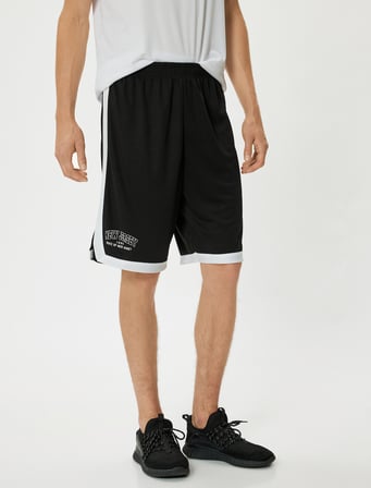 Spor Şort Oversize Slogan Baskılı Beli Lastikli Biyeli Cep Detaylı