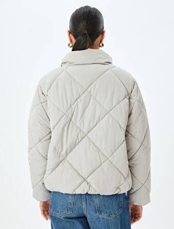 Fermuarlı Cepli Dik Yaka Kapitone Kısa Şişme Mont