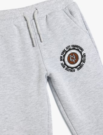 Jogger Eşofman Altı Kolej Baskılı Beli Bağlamalı Cepli Şardonlu
