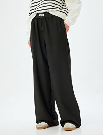 Bol Paça Pantolon Beli Lastikli Etiket Detaylı Sloganlı Cepli