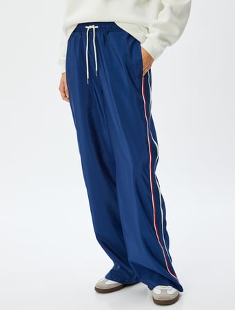 Oversize Paraşüt Pantolon Beli Bağcıklı Şerit Detaylı Paçası Fermuarlı Cepli