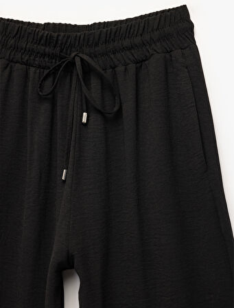 Aerobin Kumaş Beli Bağcıklı Cepli Geniş Paça Palazzo Pantolon