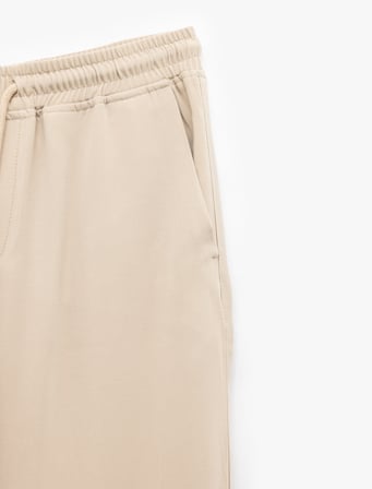 Viskon Cep Detaylı Rayon Tapered Beli Bağcıklı Eşofman Pantolon