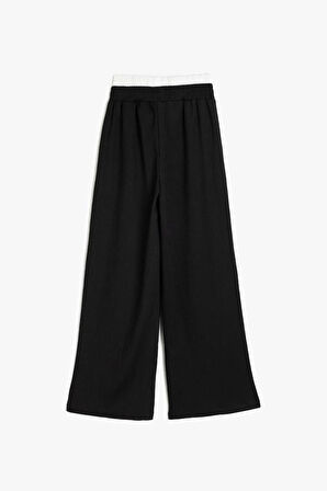 Koton Kız Çocuk Cepli Çift Bel Detaylı Beli Lastikli Basic Pantolon