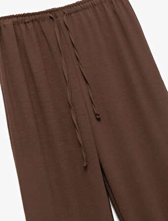 Aerobin Kumaş Geniş Paça Beli Bağcıklı Pantolon