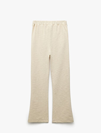 Cepli Pile Detaylı Düğmeli Bol Paça Tüvit Pantolon