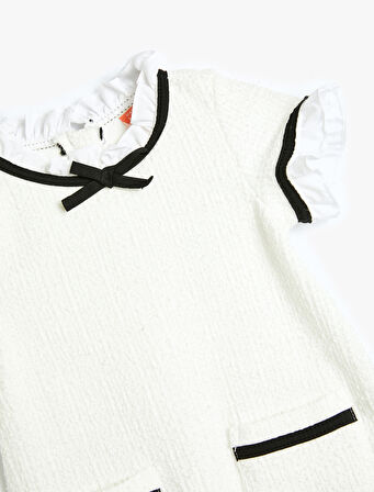 Elbise Fırfır Detaylı Kısa Kollu Yuvarlak Dik Yaka Cep Detaylı