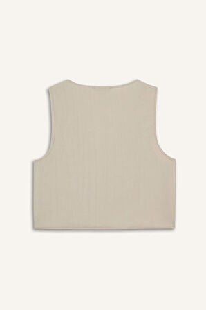 DeFacto Regular Fit V Yaka Bağlamalı Krinkıl Kumaş Kolsuz Bluz F0617AX25SMBG702