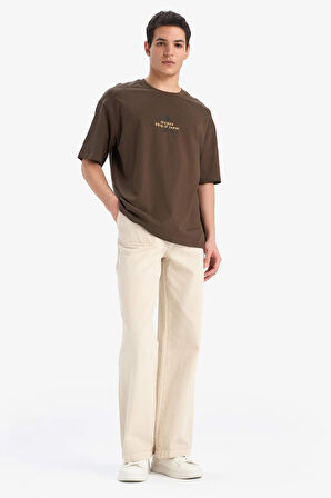 DeFacto %100 Pamuk Boxy Fit Bisiklet Yaka Sırt Baskılı Kısa Kollu Tişört F1094AX25AUBN595