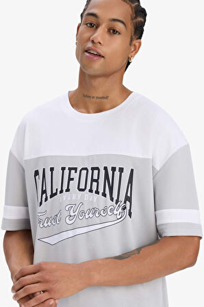 DeFactoFit Hızlı Kuruyan Oversize Geniş Kalıp Bisiklet Yaka Baskılı Sporcu Kısa Kollu Tişört E4122AX25SMGR91