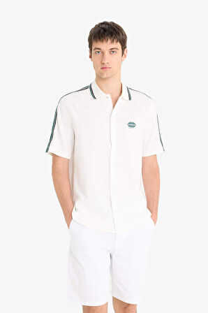 DeFacto Relax Fit Polo Yaka Hafif Kumaş Baskılı Yazlık Kısa Kollu Gömlek F0200AX25SMER105