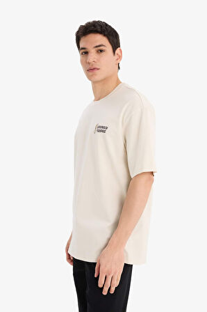 DeFacto %100 Pamuk Looney Tunes Boxy Fit Bisiklet Yaka Sırt Baskılı Kısa Kollu Tişört E9292AX25AUBG721