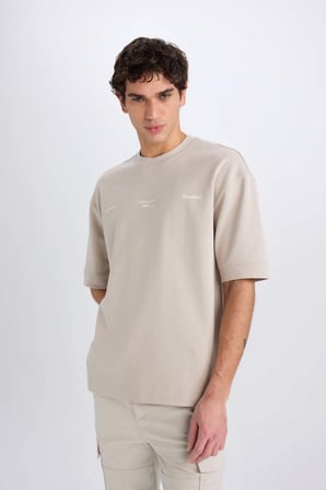DeFacto Loose Fit Bisiklet Yaka Baskılı Kısa Kollu Ağır Kumaş Tişört E0575AX25SMBG170