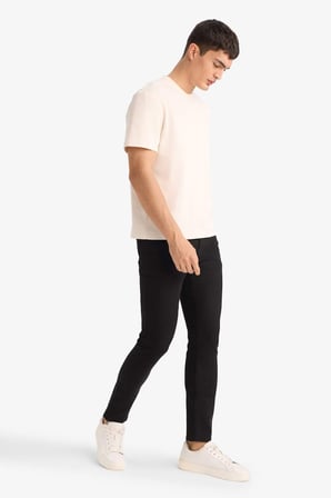 DeFacto Carlo Skinny Fit Ekstra Dar Kalıp Normal Bel Ekstra Dar Paça Jean Pantolon R8763AZ26SPNM40