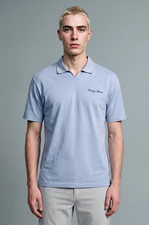 DeFacto Boxy Fit Düğmesiz Göğsü Baskılı Kısa Kollu Polo Tişört H8426AX26AUBE789