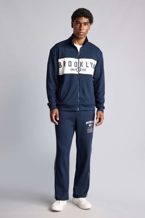 DeFacto NBA Lisanslı Brooklyn Nets Relax Fıt Skuba Dalgıç Kumaş Jogger Eşofman Altı H7758AX26AUNV253