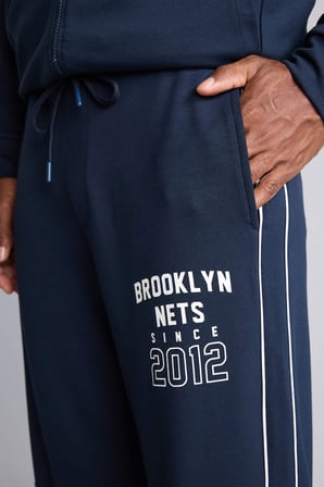 DeFacto NBA Lisanslı Brooklyn Nets Relax Fıt Skuba Dalgıç Kumaş Jogger Eşofman Altı H7758AX26AUNV253