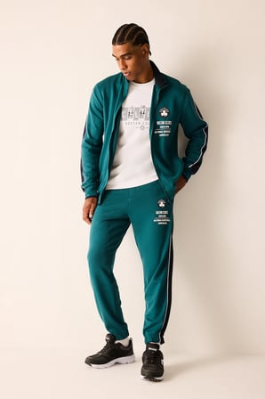DeFacto NBA Boston Celtics Yan Şeritli Standart Fit Dalgıç Kumaş Jogger H7761AX26AUGN1020