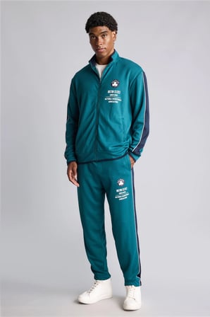 DeFacto NBA Boston Celtics Yan Şeritli Standart Fit Dalgıç Kumaş Jogger H7761AX26AUGN1020