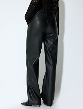 Koton X Sibil Çetinkaya - Cepli Bol Düz Paça Suni Deri Pantolon