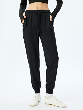 Cep Detaylı Yüksek Bel Bağcıklı Yumuşak Tuşe Jogger Spor Eşofman Altı İnterlok