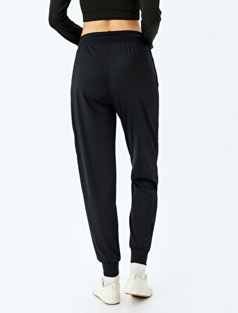 Cep Detaylı Yüksek Bel Bağcıklı Yumuşak Tuşe Jogger Spor Eşofman Altı İnterlok