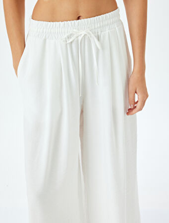 Rahat Kalıp Beli Lastikli Cepli Geniş Paça Yüksek Bel Pantolon