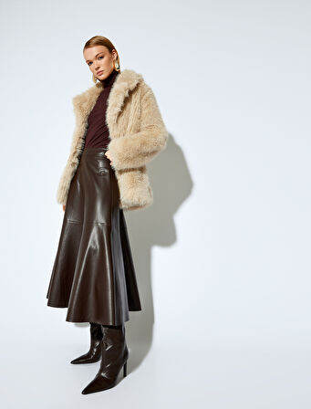 Koton X Melis Ağazat - Yuvarlak Kloş Form Midi Boy Suni Deri Etek 