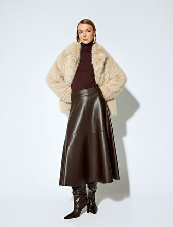 Koton X Melis Ağazat - Yuvarlak Kloş Form Midi Boy Suni Deri Etek 