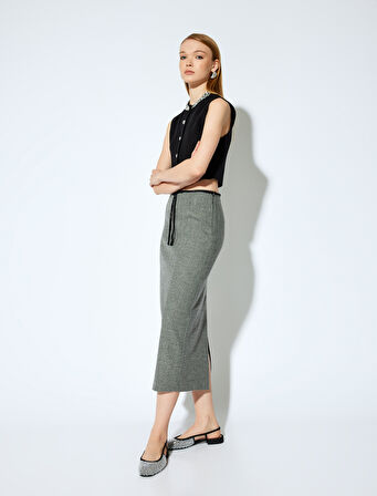 Koton X Melis Ağazat - Yırtmaçlı Fiyonk Detaylı Midi Boy Kalem Etek