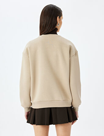 Koton X Şahika Ercümen -  Uzun Kollu Nakış Detaylı Oversize Sweatshirt