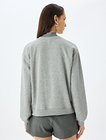 Koton X Şahika Ercümen - Nakış Detaylı Baskılı Uzun Kollu Oversize Sweatshirt