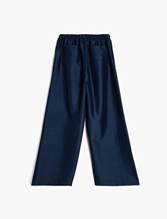 Nervürlü Cepli Geniş Paça Pantolon