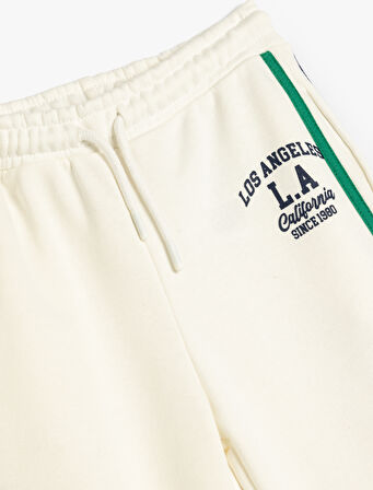 Baskı Detaylı Beli Bağlamalı Cepli Biyeli Eşofman Altı 