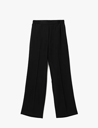Beli Lastikli Cepli Bol Paça Kumaş Pantolon
