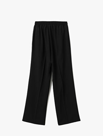 Beli Lastikli Cepli Bol Paça Kumaş Pantolon